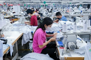 Công nhân làm việc tại các nhà máy về may mặc tại Bắc Ninh.