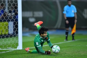 Thủ môn Văn Bình có 10 lần cản phá thành công các pha dứt điểm của U23 Hàn Quốc. Ảnh: AFC.