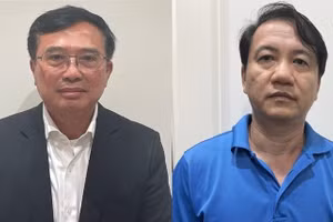 Bị can Hoàng Quốc Vượng và Phương Hoàng Kim (bên phải). Ảnh: BCA