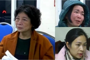 Bị can Phạm Thị Hòa (trái) và đồng phạm. Ảnh: Đ.X