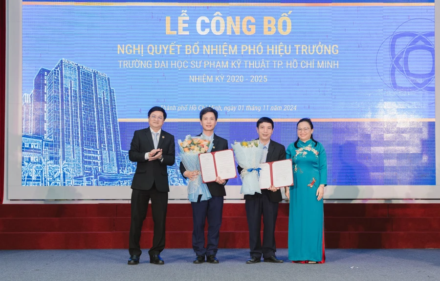 TS Quách Thanh Hải (thứ hai từ phải sang) và PGS.TS Châu Đình Thành (thứ ba từ phải sang) nhận quyết định bổ nhiệm Phó Hiệu trưởng. Ảnh: HCMUTE