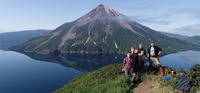 participants-of-the-expedition-to-the-kuril-islands-in-2022-against-the-background-of-the.png