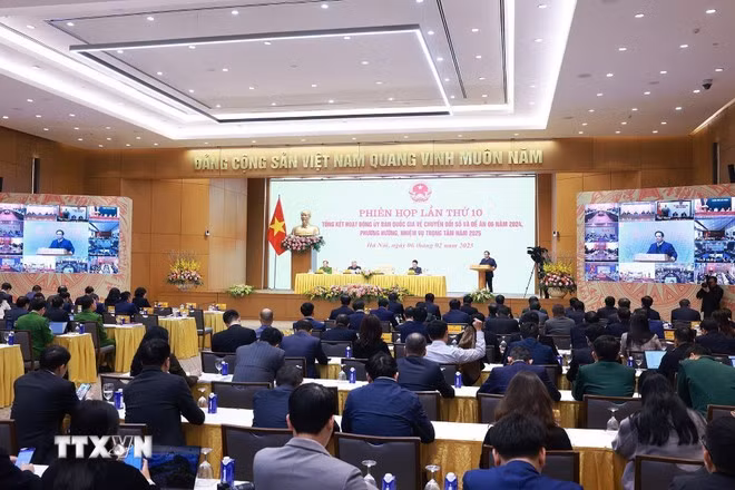 Phiên họp tổng kết hoạt động của Ủy ban và Đề án 06. (Ảnh: Dương Giang/TTXVN).