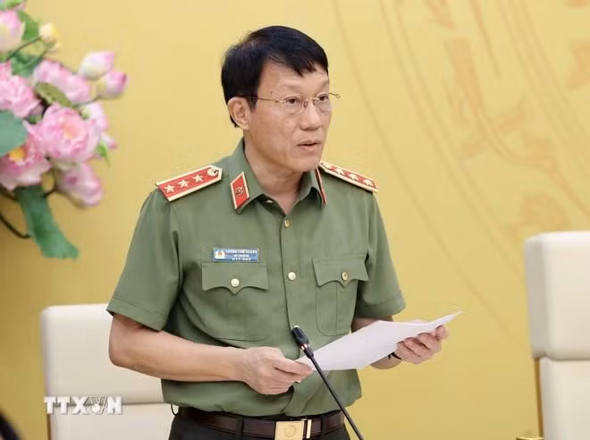Thượng tướng Lương Tam Quang, Ủy viên Trung ương Đảng, Bí thư Đảng ủy Công an Trung ương, Bộ trưởng Bộ Công an phát biểu khai mạc. (Ảnh: Nhan Sáng/TTXVN).
