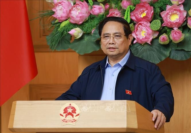 Thủ tướng Phạm Minh Chính chủ trì cuộc họp về phát triển sàn dữ liệu tại Việt Nam. Ảnh: Dương Giang/TTXVN