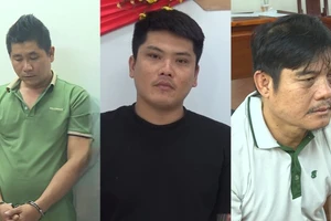 Nguyễn Thanh Hải (phải) cùng đồng phạm tại cơ quan điều tra. (Ảnh: Công an TPHCM).