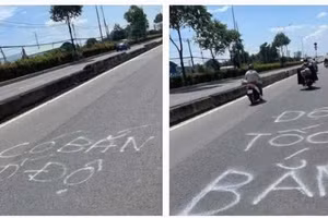 Hình ảnh ghi lại dòng chữ "có bắn tốc độ" trên mặt đường Lê Quang Đạo. (Ảnh: Công an TPHCM)