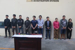 Các bị can bị khởi tố vì hoạt động đòi nợ thuê trái pháp luật. (Ảnh: Công an TPHCM).