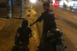 Công an dựng lại hiện trường vụ việc. (Ảnh: Công an TPHCM).