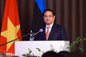 Thủ tướng Phạm Minh Chính phát biểu tại Diễn đàn doanh nghiệp Việt Nam-Estonia. (Ảnh: Dương Giang/TTXVN)