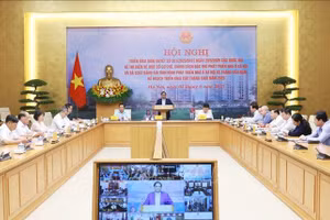 Thủ tướng Phạm Minh Chính chủ trì Hội nghị triển khai Nghị quyết của Quốc hội về thí điểm một số cơ chế, chính sách đặc thù phát triển nhà ở xã hội. (Ảnh: Dương Giang/TTXVN)