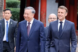 Tổng Bí thư Tô Lâm và Tổng thống Pháp Emmanuel Macron. (Ảnh: Thống Nhất/TTXVN).