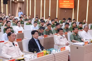 Chủ tịch nước Lương Cường và các đại biểu dự Hội nghị sơ kết công tác 6 tháng đầu năm 2025 của Bộ Công an. (Ảnh: Lâm Khánh/TTXVN)