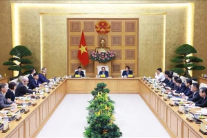 Thủ tướng Phạm Minh Chính gặp mặt đại diện các doanh nghiệp Hoa Kỳ đang đầu tư, kinh doanh tại Việt Nam. (Ảnh: Dương Giang/TTXVN)