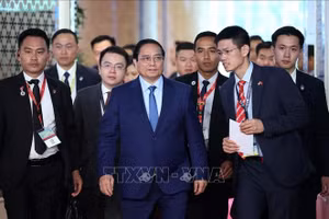 Thủ tướng Phạm Minh Chính đến dự phiên thảo luận. Ảnh: Dương Giang/TTXVN.