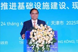 Thủ tướng Phạm Minh Chính phát biểu tại Diễn đàn kết nối doanh nghiệp Việt Nam - Trung Quốc. (Ảnh: Dương Giang/TTXVN)