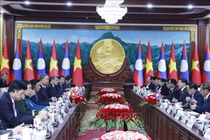 Tổng Bí thư Tô Lâm hội đàm với Tổng Bí thư, Chủ tịch nước Lào Thongloun Sisoulith. Ảnh: Thống Nhất/TTXVN