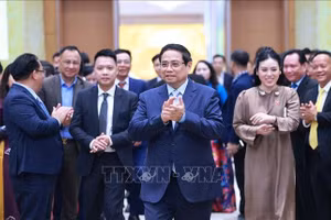 Thủ tướng Phạm Minh Chính đến dự Hội nghị Doanh nghiệp góp phần vào tăng trưởng hai con số và Thủ tướng Chính phủ tri ân doanh nghiệp. Ảnh: Dương Giang/TTXVN