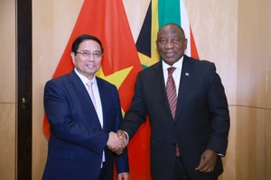 Thủ tướng Phạm Minh Chính hội kiến Tổng thống Cộng hòa Nam Phi Matamela Cyril Ramaphosa. (Ảnh: Dương Giang/TTXVN)