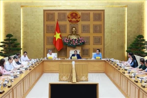Thủ tướng Phạm Minh Chính chủ trì họp triển khai Triển lãm thành tựu của đất nước nhân dịp kỷ niệm 80 năm Quốc khánh. (Ảnh: Dương Giang/TTXVN)