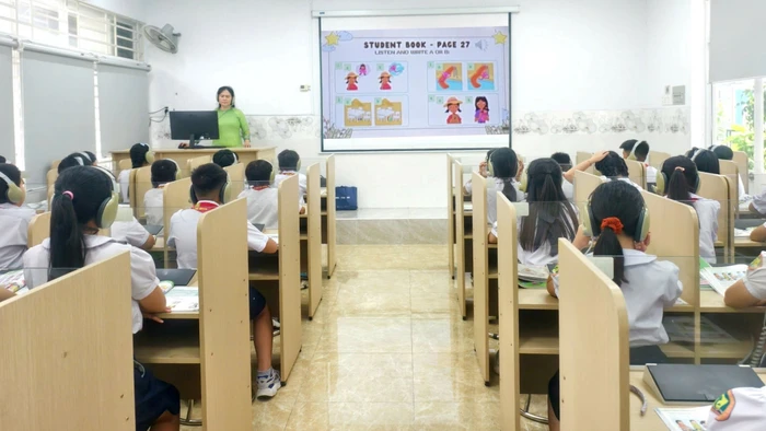 Học sinh Trường Tiểu học Hồ Văn Huê trong giờ học. Ảnh: NTCC