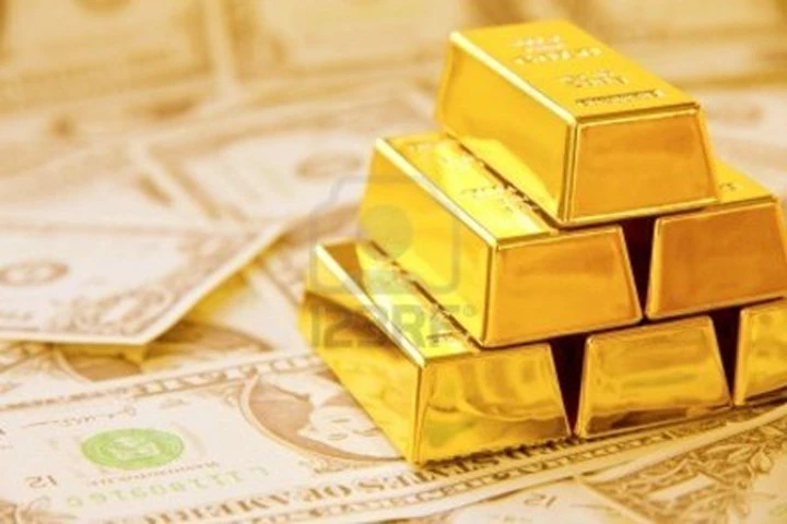 Vàng thế giới giảm mạnh, đồng USD tăng vọt