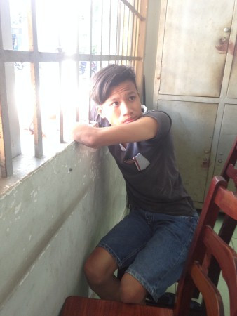 Sang và Thanh - hung thủ tạt axít - sa lưới. Ảnh: Phùng Bắc