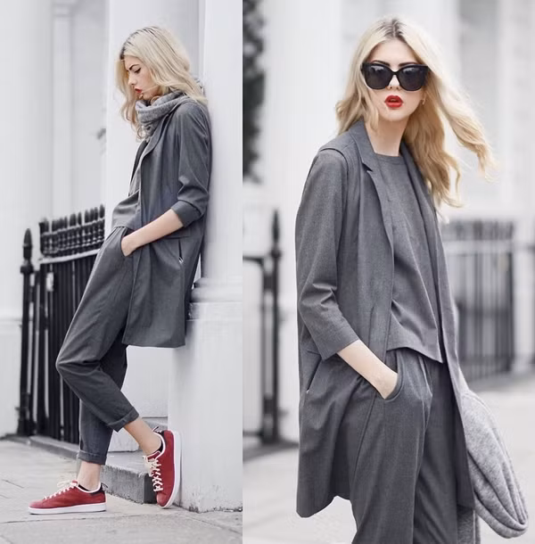 Fashionista 20 tuổi Ebba Zingmark biến suit trở nên mềm mại nhưng lại đầy hơi thở đường phố khi dùng pant suit xắn gấu tông xám. style-cua-cac-blogger-trong-gio-lanh-dau-mua-1
