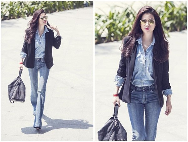Trong khi đó, Trương Ngọc Ánh phối trang phục "cây denim" ấn tượng. Bộ cánh giúp bà mẹ một con trông khỏe khoắn và mạnh mẽ. Học Sao Việt cách phối quần ống loe sành điệu