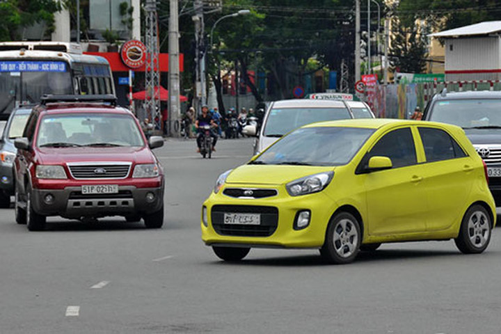 Taxi công nghệ phát triển nhanh khiến các hãng taxi truyền thống lo lắng trong khi nhà nước lại lúng túng trong quản lý. Ảnh: Tấn Thạnh