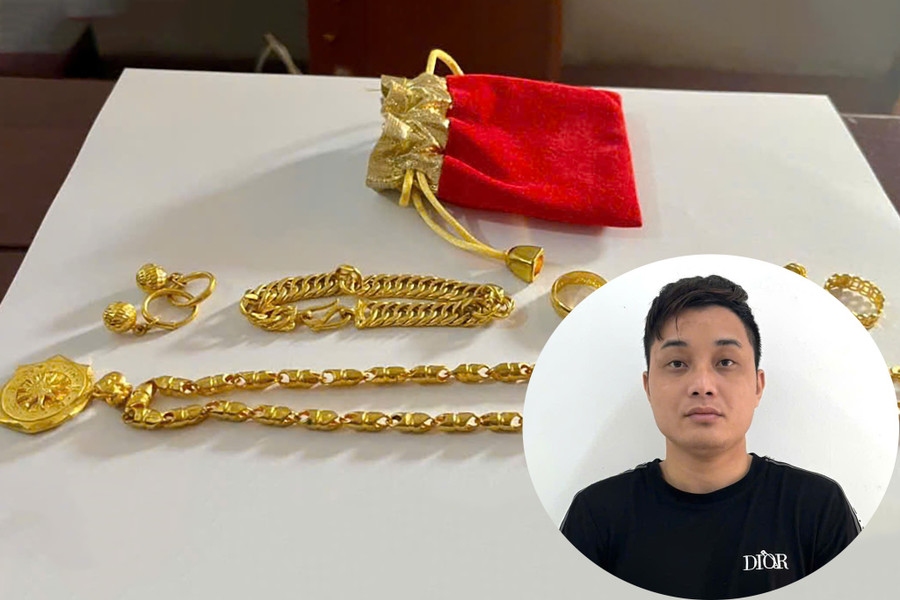 Đối tượng Hoàng Vũ Lập và tang vật vụ án. (Ảnh: CANA)