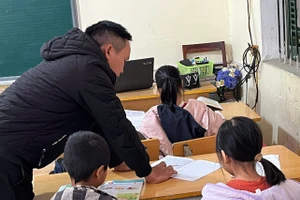 Một tiết học của học sinh trường PTDTBT Tiểu học và THCS Pu Luông, xã Mường Nhà.