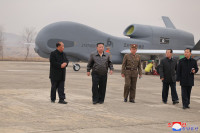 ong-kim-jong-un-chi-dao-cong-tac-nghien-cuu-uav-01.jpg