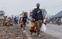 dong-nguoi-chay-tron-khoi-cuoc-tan-cong-cua-quan-noi-day-congo-012.jpg