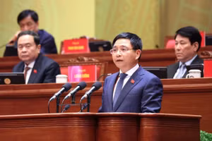 Bộ trưởng Tài chính Nguyễn Văn Thắng báo cáo tham luận tại Đại hội Đảng XIV, ngày 21/1. Ảnh: TTXVN