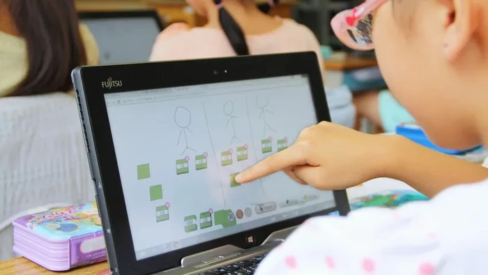 Biên soạn SGK điện tử góp phần tạo ra nguồn học liệu số phong phú. Ảnh: KYODO