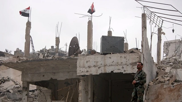 Khung cảnh hoang tàn ở al-Hajar al-Aswad, Syria ngày 22/5