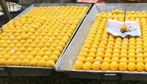 een here at a market in Kolkata, are popular sweets for celebratory occasions.