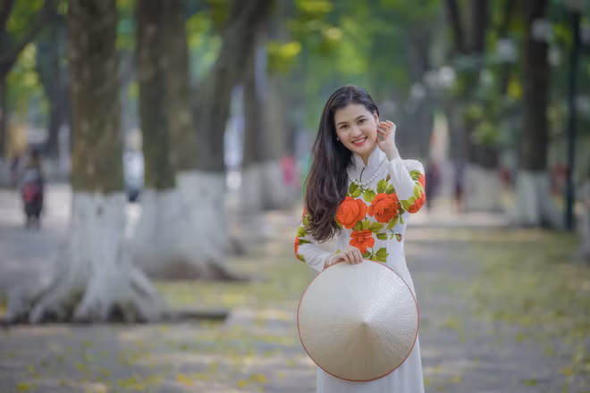 Sự thật thú vị về bức ảnh người con gái Việt xinh đẹp mặc áo dài - Ảnh 4.