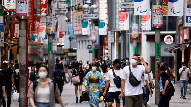 Người Nhật đeo khẩu trang chống Covid-19.