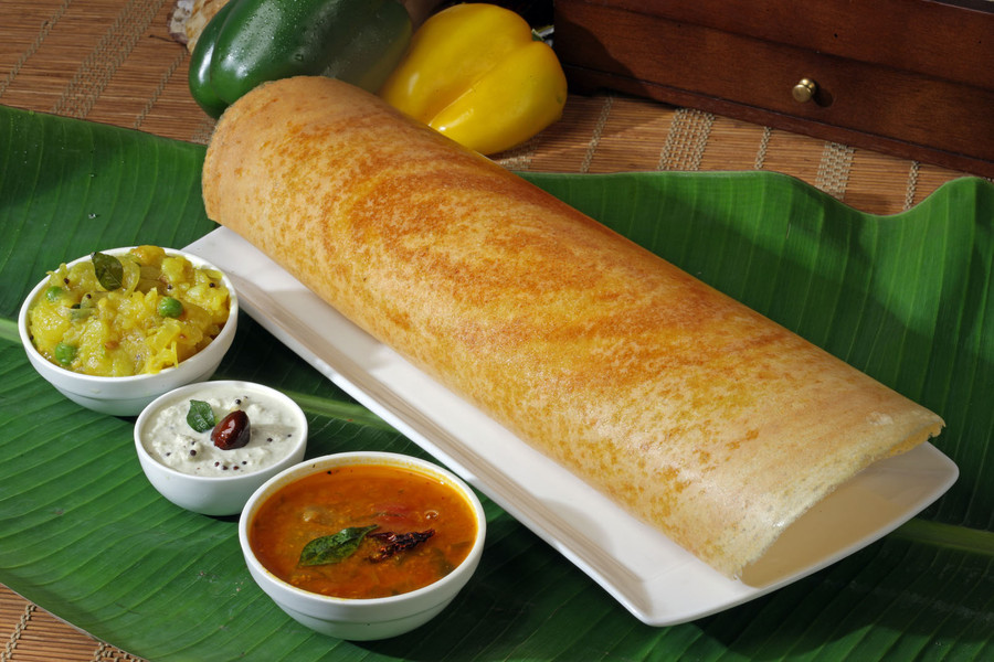 Dosas, Nam Á: Những chiếc bánh dosa mỏng, thơm, giòn được làm từ bột gạo lên men và đậu lăng. Người Ấn Độ thường ăn bánh này vào buổi sáng cùng với một số loại rau củ như khoai tây tẩm gia vị. Ảnh: Breathebooks. Dosas, Nam Á: Những chiếc bánh dosa mỏng, thơm, giòn được làm từ bột gạo lên men và đậu lăng. Người Ấn Độ thường ăn bánh này vào buổi sáng cùng với một số loại rau củ như khoai tây tẩm gia vị. Ảnh: Breathebooks.