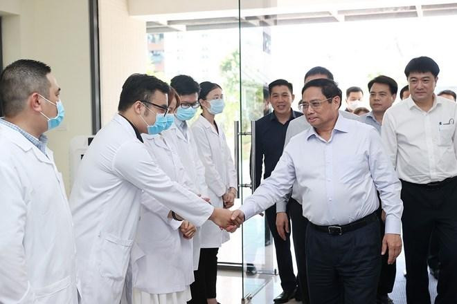 Thủ tướng Phạm Minh Chính thăm Trung tâm giám định ADN, Viện Công nghệ Sinh học. (Ảnh: Dương Giang/TTXVN). Thủ tướng Phạm Minh Chính thăm Trung tâm giám định ADN, Viện Công nghệ Sinh học. (Ảnh: Dương Giang/TTXVN).