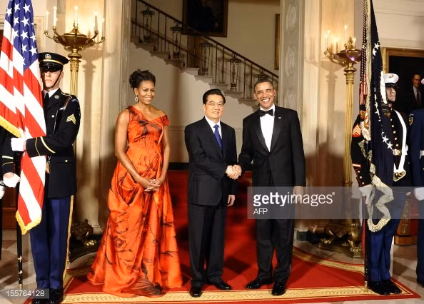 Đệ nhất phu nhân Michelle Obama chuộng thương hiệu thời trang nào? ảnh 1