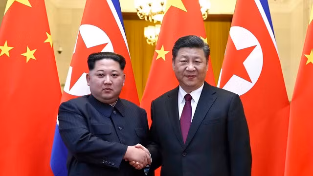 Lãnh đạo Triều Tiên Kim Jong un và Chủ tịch Trung Quốc Tập Cận Bình
