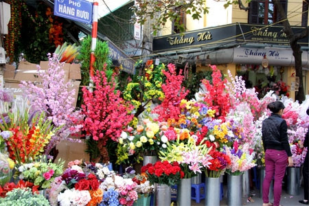Tết về rộn ràng trên khắp phố phường Hà Nội ảnh 17 Tết về rộn ràng trên khắp phố phường Hà Nội
