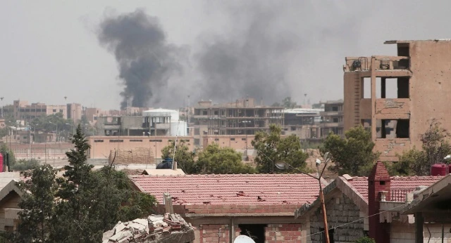 Khói bốc lên từ thành phố Hasaka, Syria