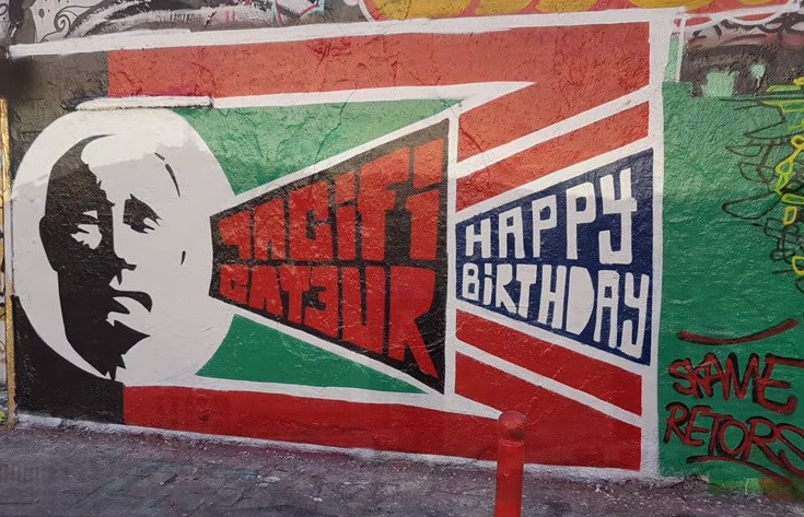 Một trong những hình vẽ graffiti xuất hiện ở một số thành phố châu Âu mừng sinh nhật ông Putin