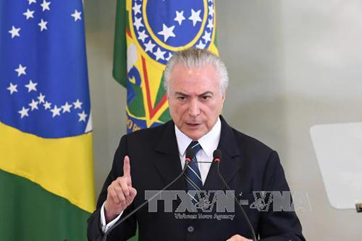 Tổng thống Brazil Michel Temer tuyên bố không từ chức. Ảnh: AFP/TTXVN