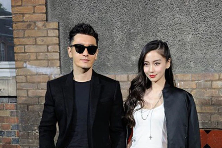 Vợ chồng Angelababy - Huỳnh Hiểu Minh cực ngầu tại Paris Fashion Week