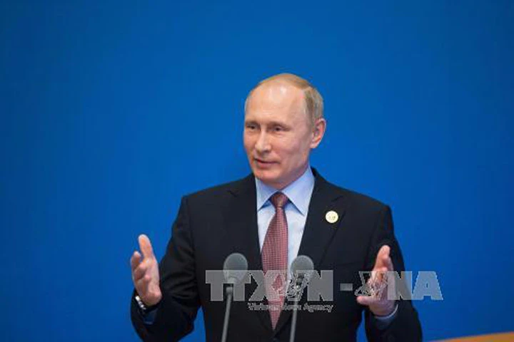 Tổng thống Nga Vladimir Putin giành được sự tin tưởng tuyệt đối của người dân Nga. Ảnh: EPA/TTXVN 